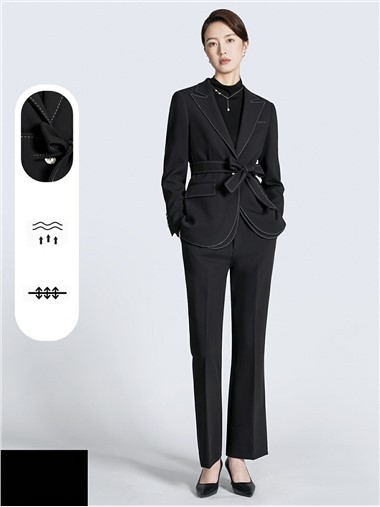 What are the best jewelry pieces to wear with a bespoke pink suit for women?